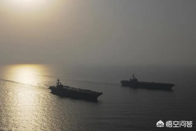 美国航母舰队包围伊朗,军费从哪里来,每天需要投入多少军费?