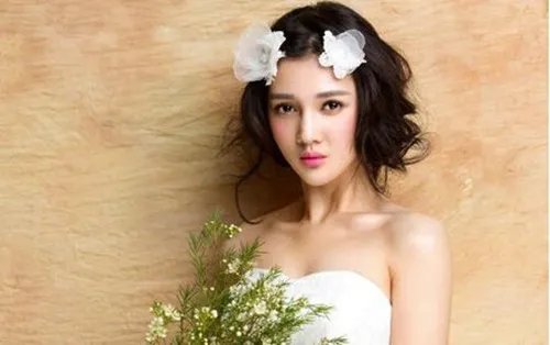 圆脸婚纱照新娘发型2017款 圆脸新娘发型打造要点