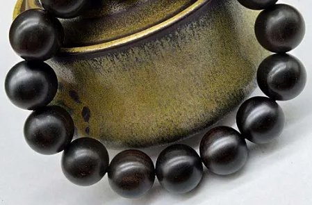 紫光檀包浆是什么样的？紫光檀有什么用途和功能？